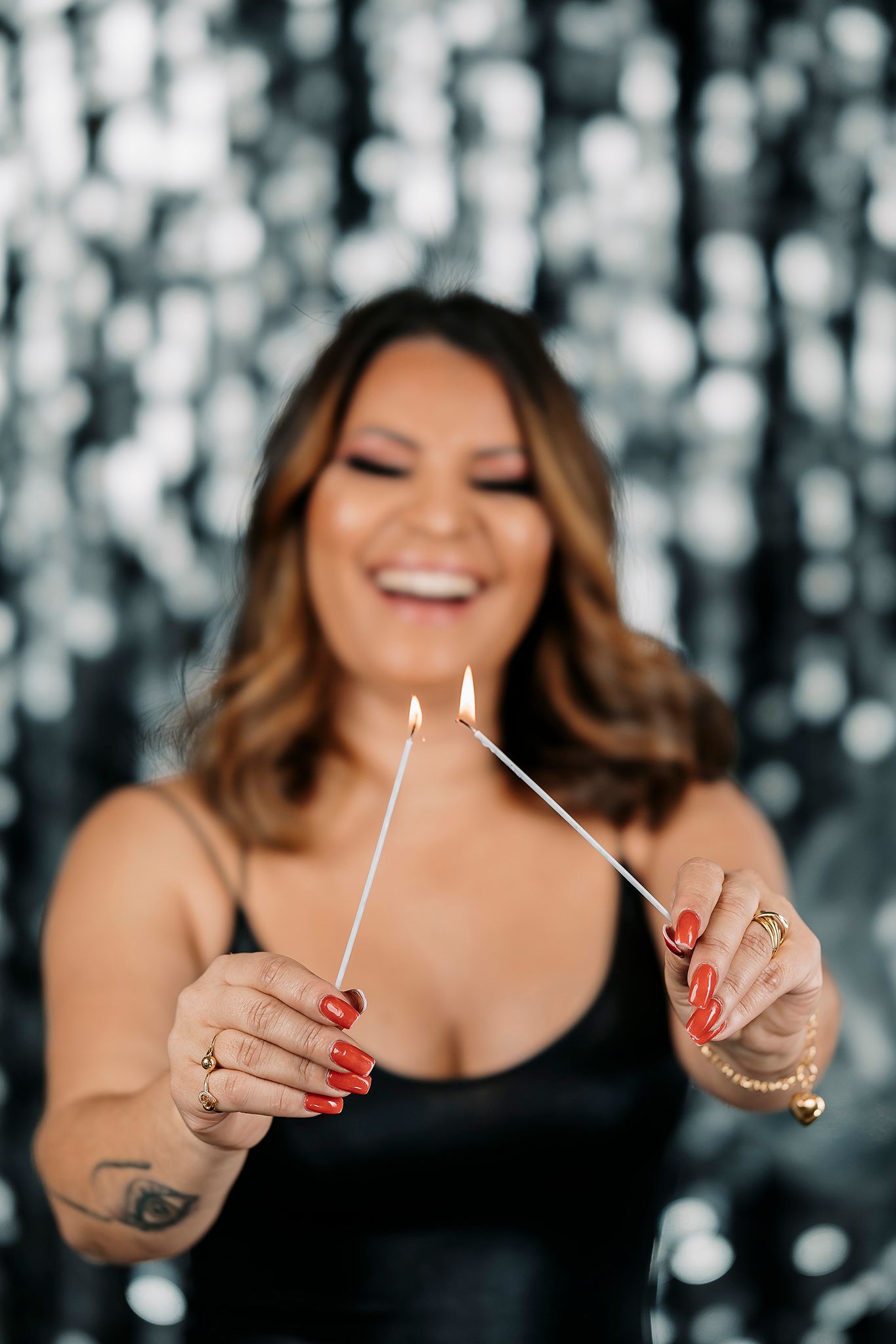Playful series of photos showing interaction with party decorations.