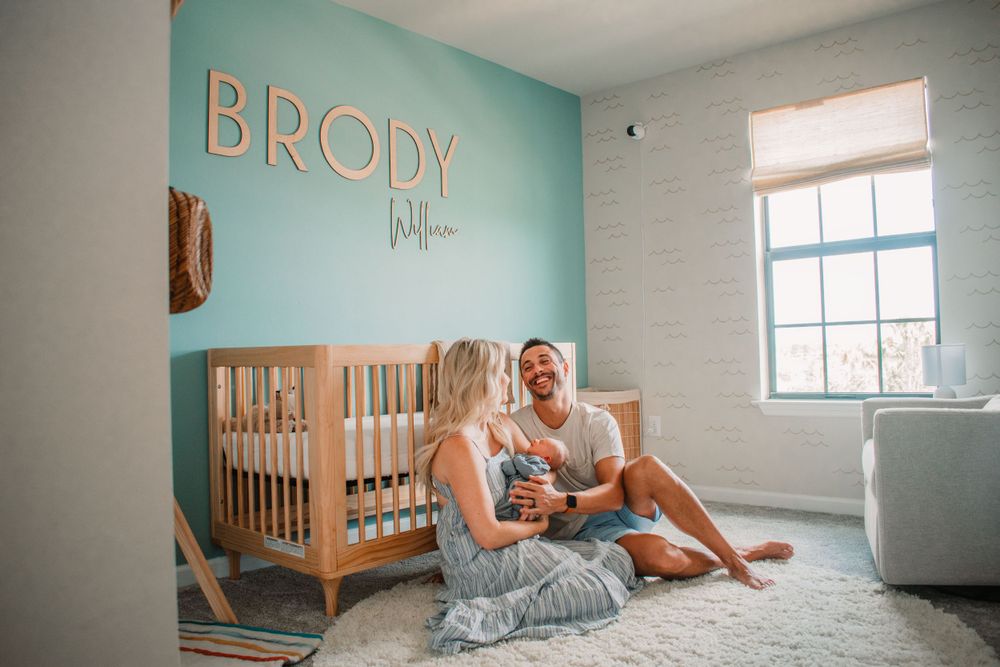 Family of three during newborn lifestyle session