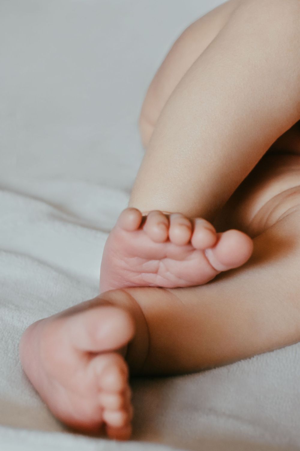 Close-up photo of newborn fingers and toes