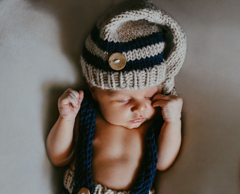 Lifestyle newborn portraits in Sarasota living room
