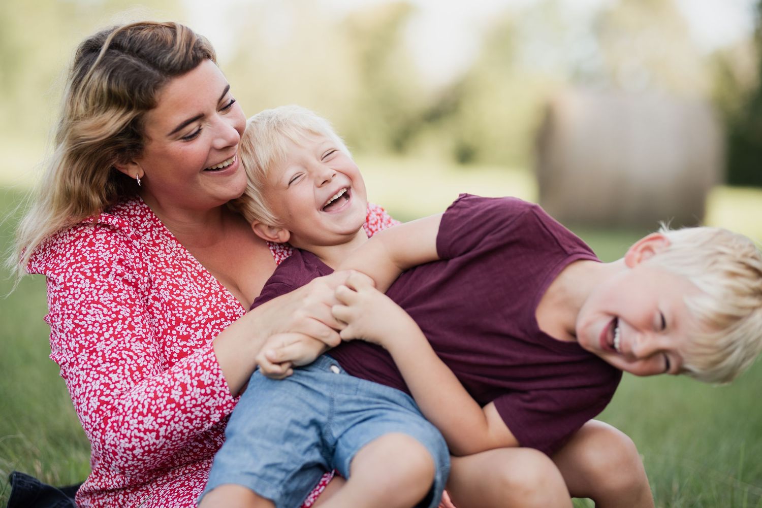 Genuine expressions of happiness and love shared during outdoor play session.