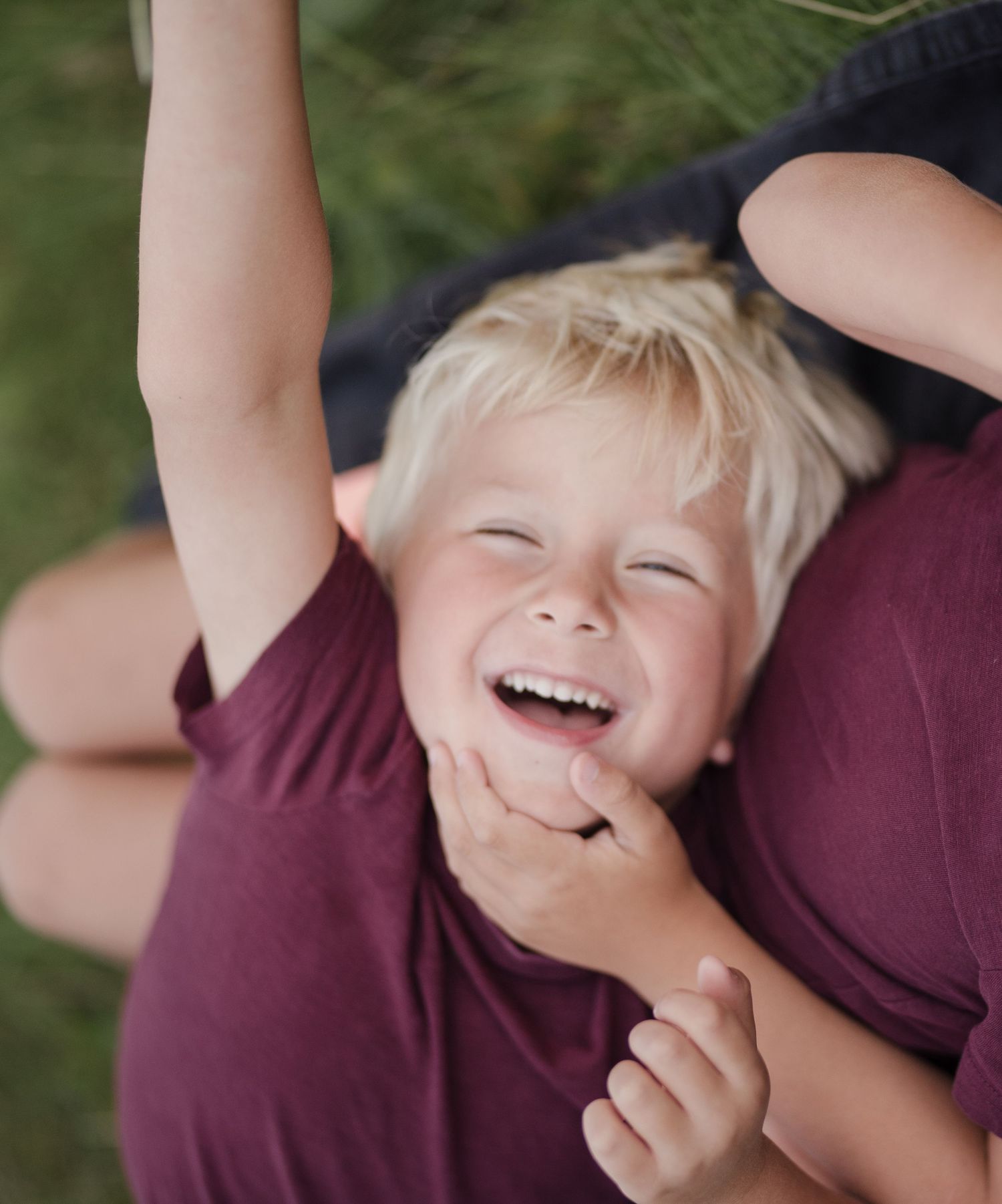 Pure joy and laughter captured during an outdoor playtime session.