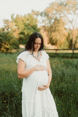 I can't wait to meet you! Maternity photography in a pasture in Houston.