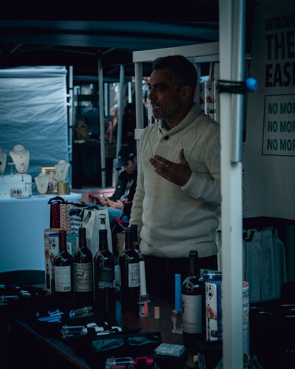 man selling his product at the farmer market in the gaslamp district in downtown san diego, ca