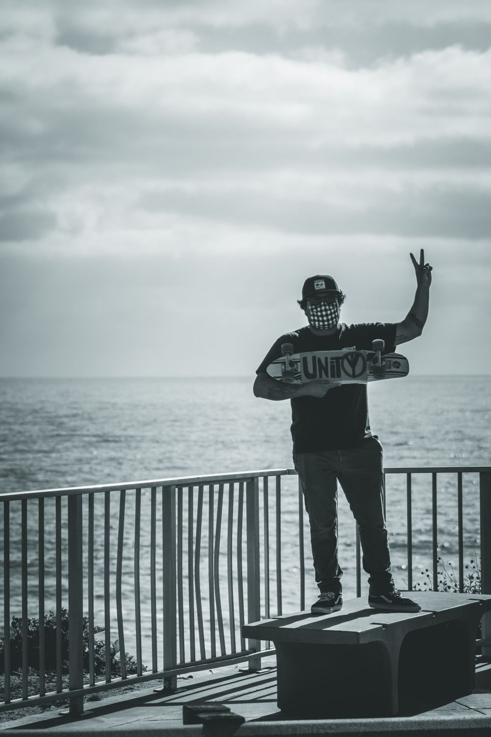 Man Holding up the Peace Sign at a Black Lives Matter Protest in Carlsbad, CA in Black and White
