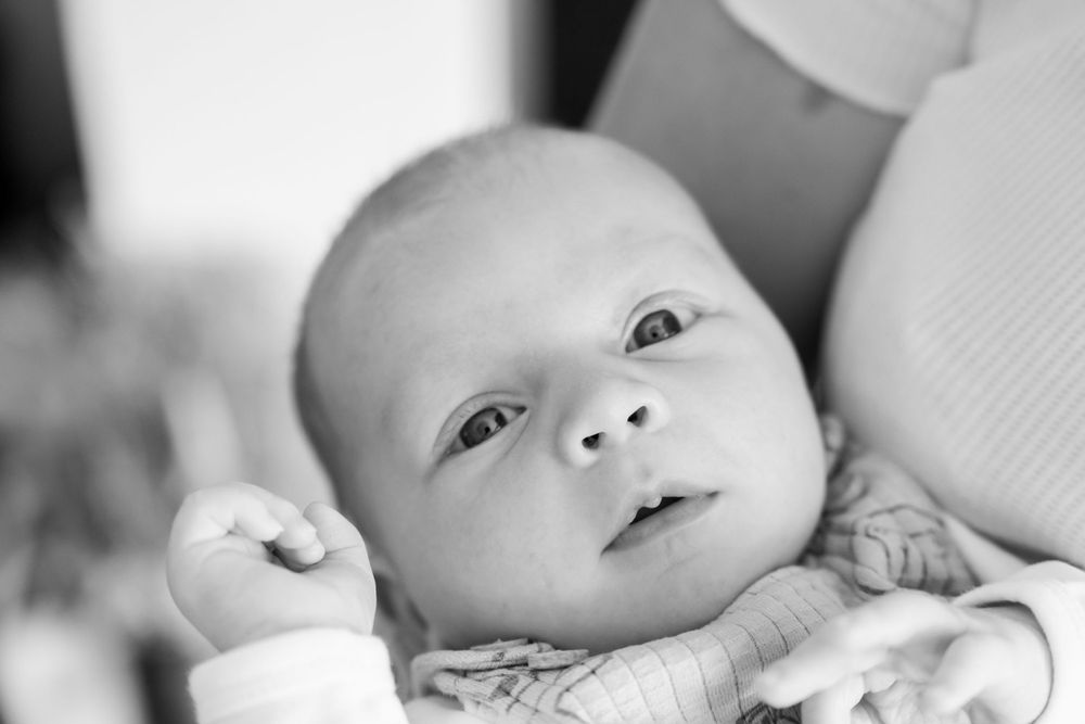 black and white photograph of newborn baby boy