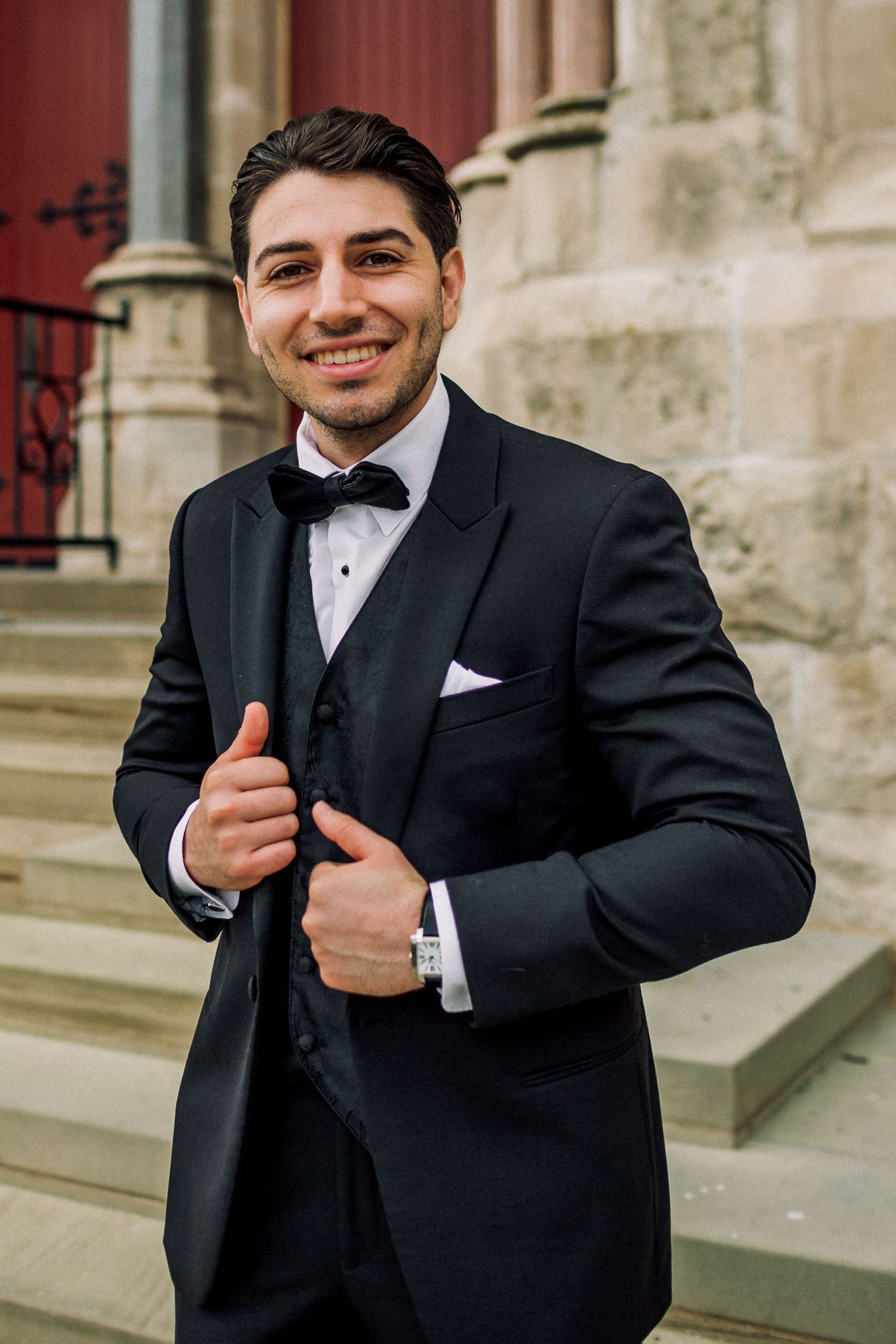 Handsome groom before their beautiful catholic wedding ceremony at the Basilica of Our Lady Immaculate church in Guelph.