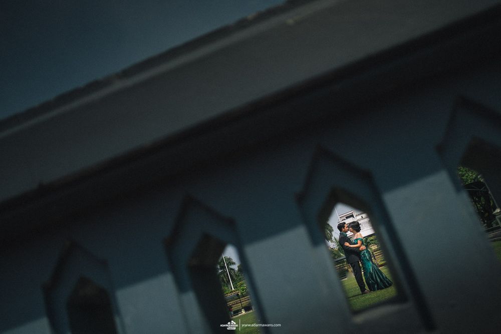 Stained glass church windows photographed in dramatic low lighting with architectural details.