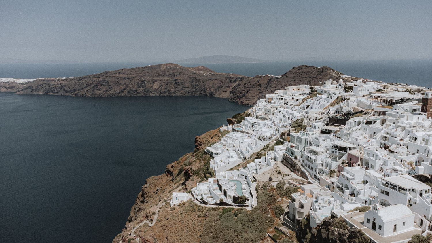 santorini drone shot from the sky