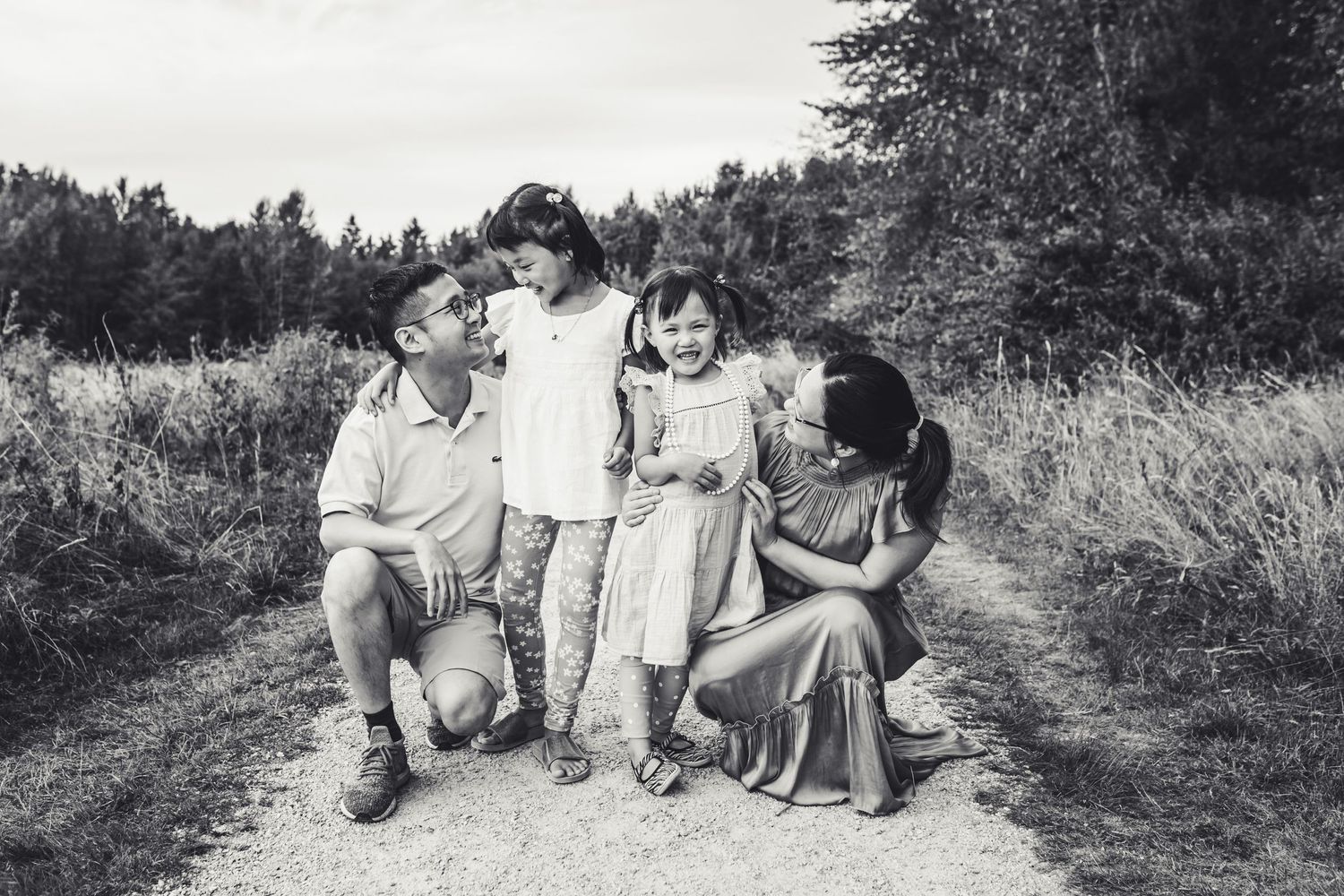 Family laughing and tickling each other in Surrey BC