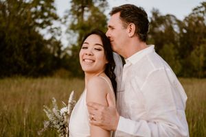 Candid moments of joy captured in a sunlit field.