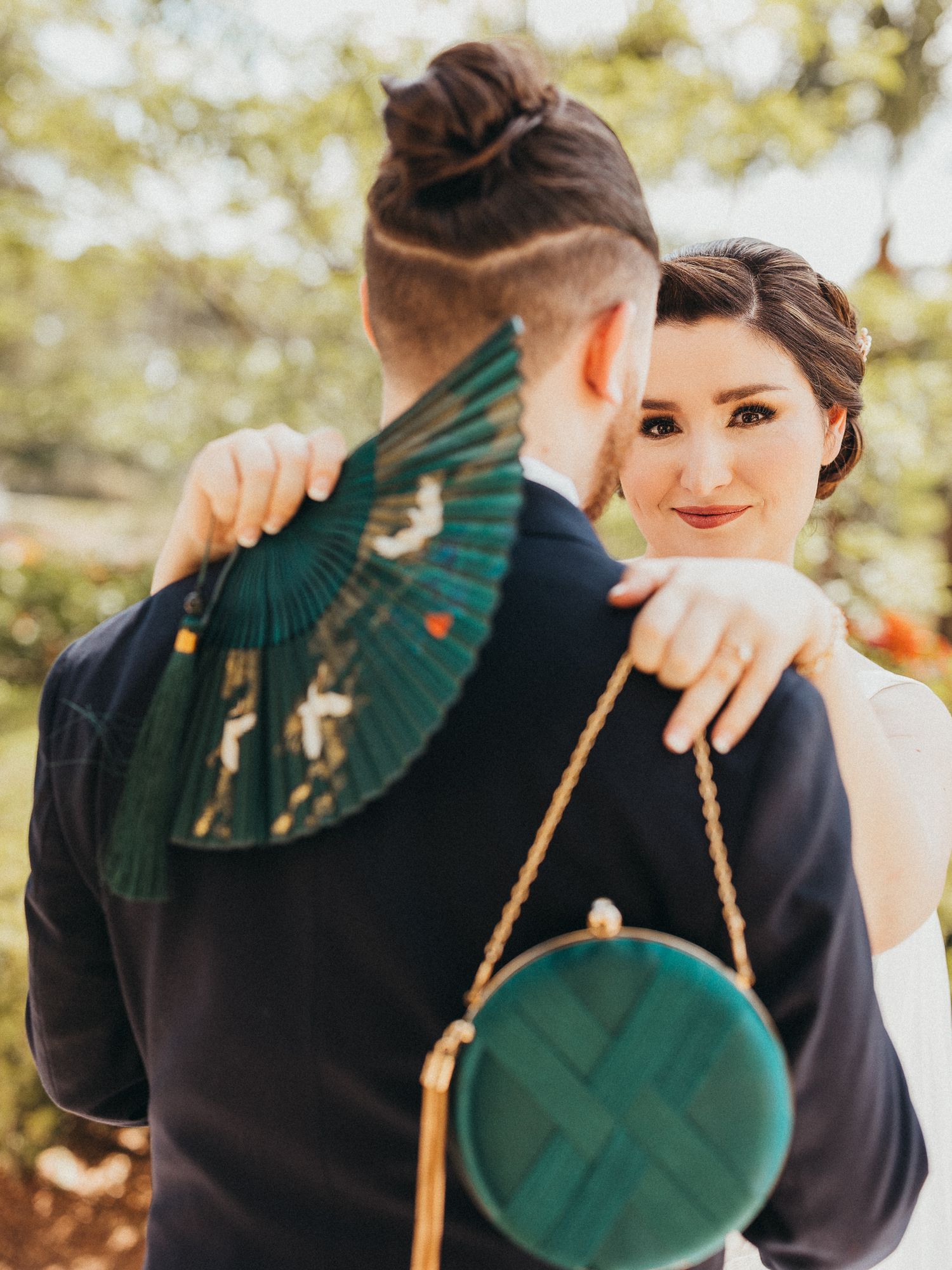 Jade green bride and groom wedding portrait.