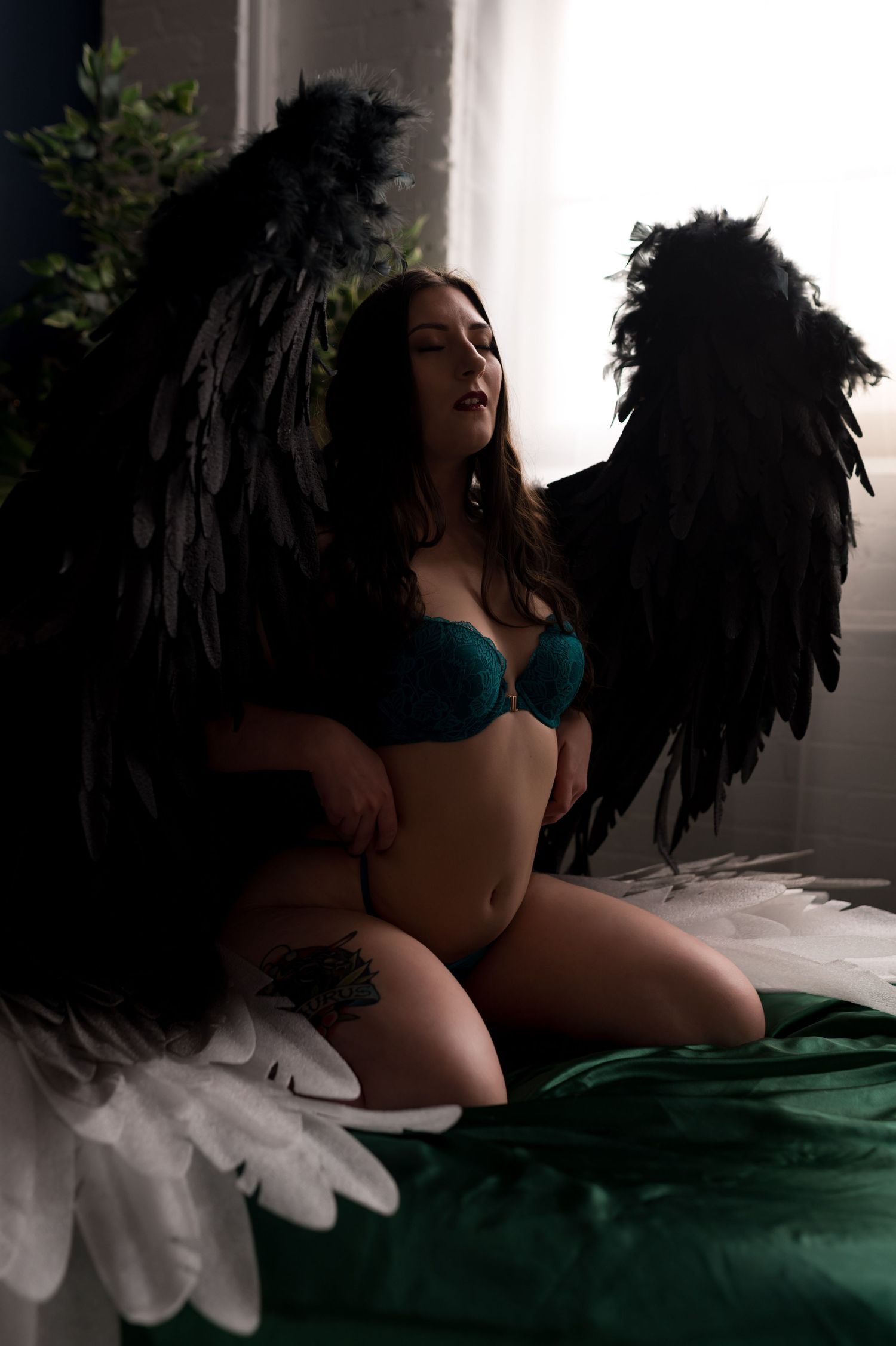 Angel Wing boudoir photoshoot in Buffalo NY studio.