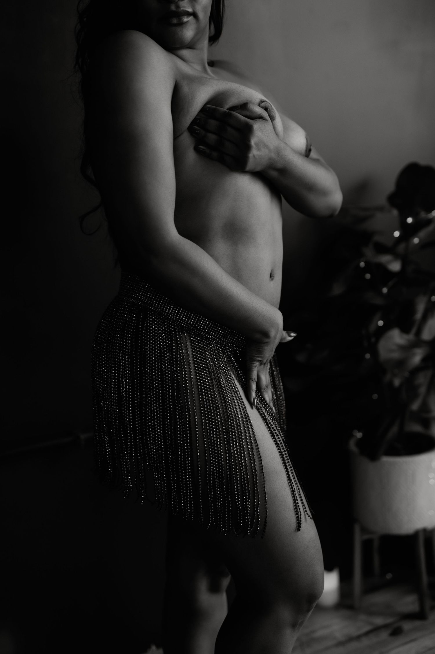 Buffalo NY boudoir photographer captures raw emotion in nude black-and-white portrait