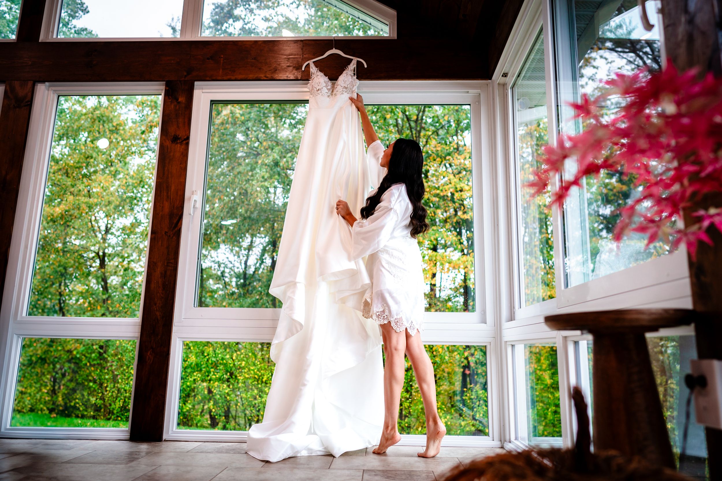 Panoramic sequence of bridal preparation moments in a sunlit room with large windows.