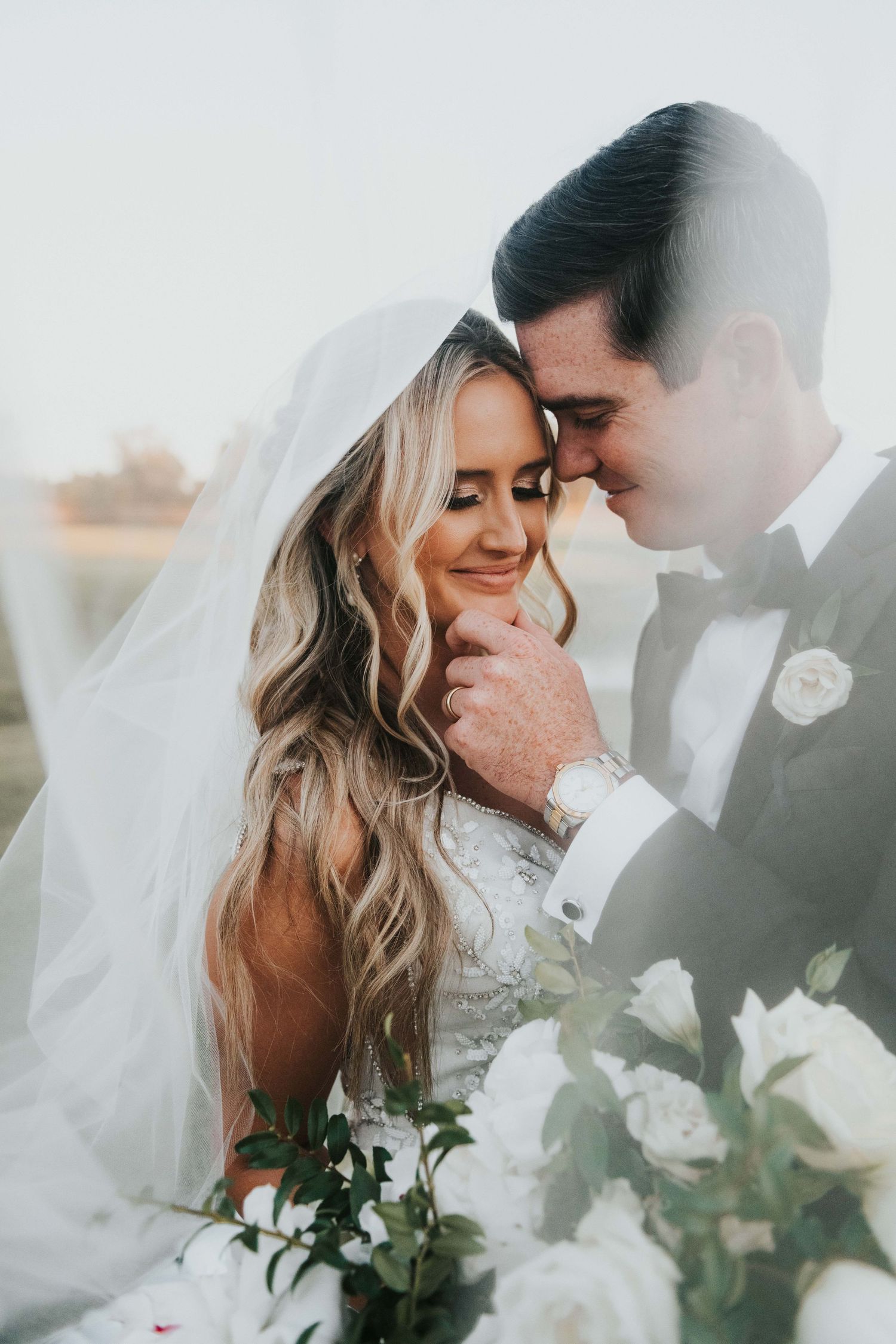 Stunning bride and groom at their luxury wedding in Montgomery, Texas. Captured by a destination wedding photographer