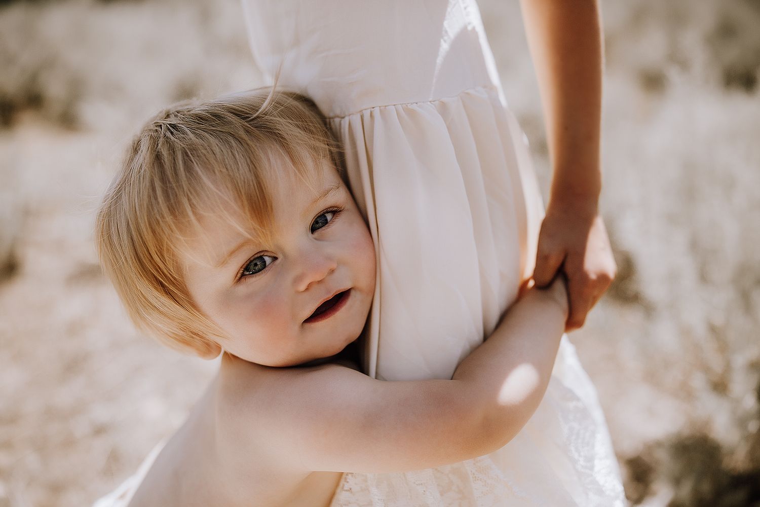 little boy hugging his sister