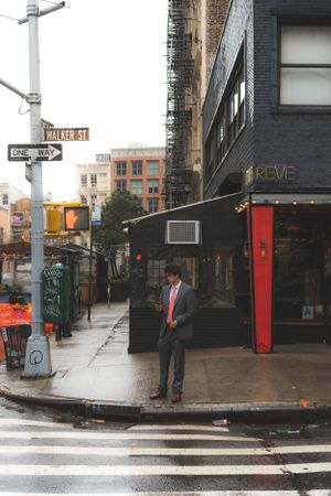 A man waiting in the rain in Soho, Manhattan