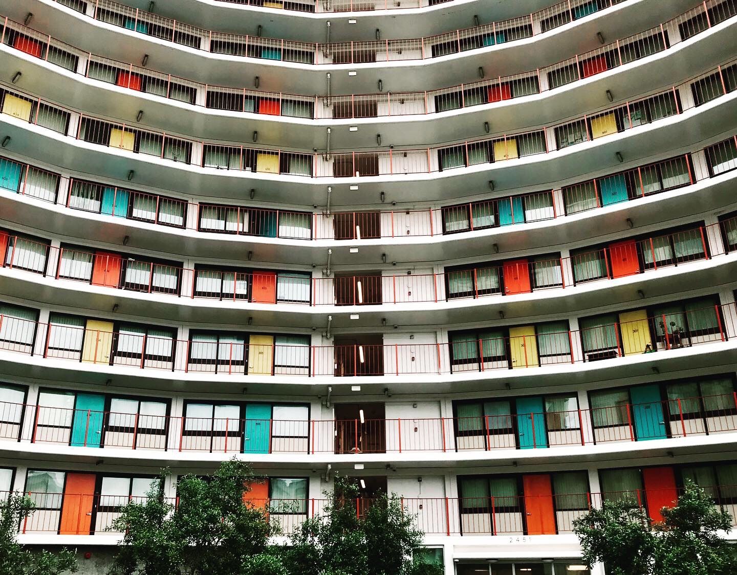 JFK towers, Blue, red, yellow doors, patios