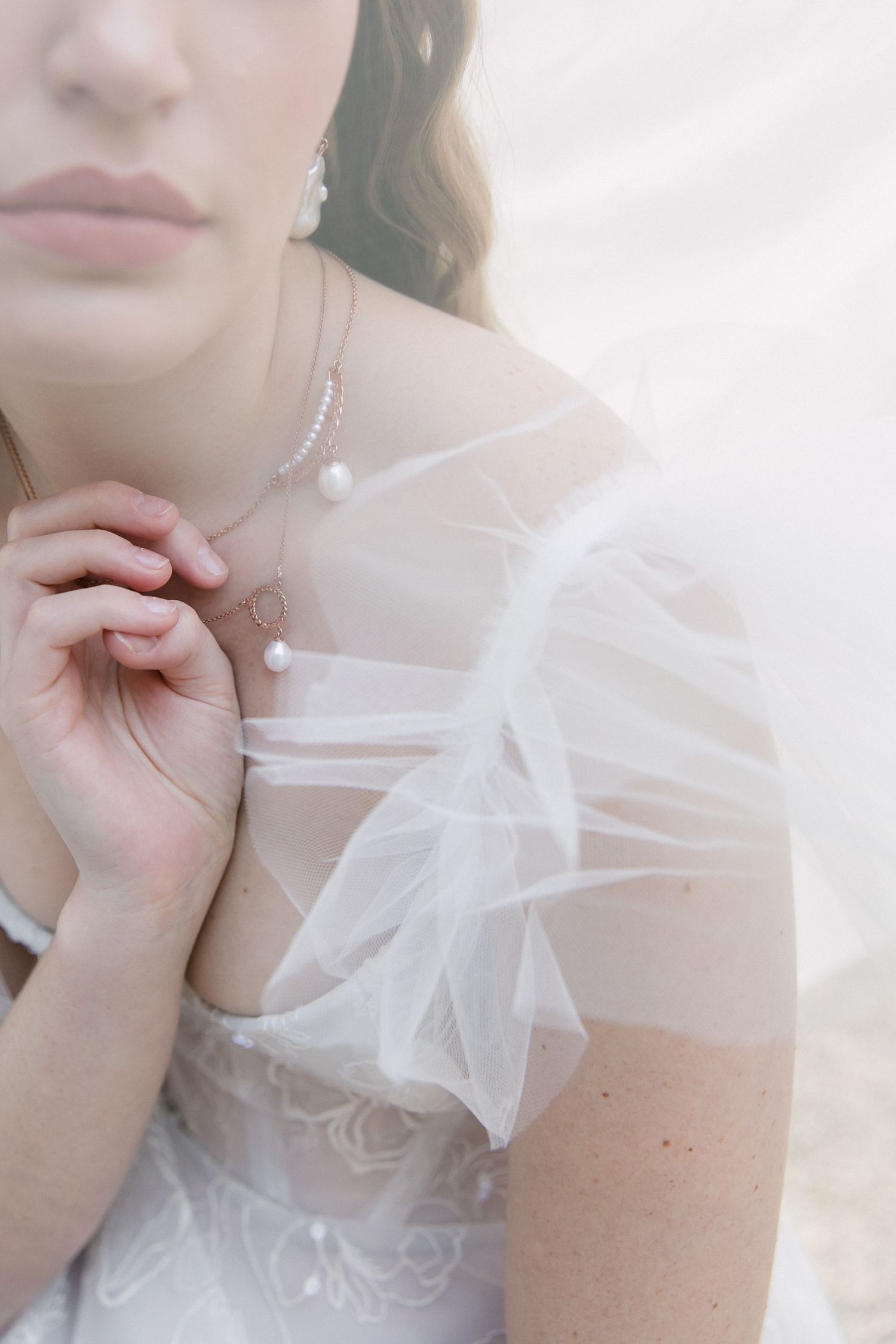 Beautiful details captured of a bride's Elli Nicole wedding dress and Miinella jewellery.