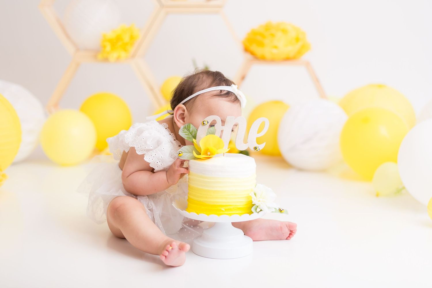 Yellow honey bee cake smash session, baby with cake, sarasota baby photos, Port Charlotte family photographer, north port newborn photoshoot