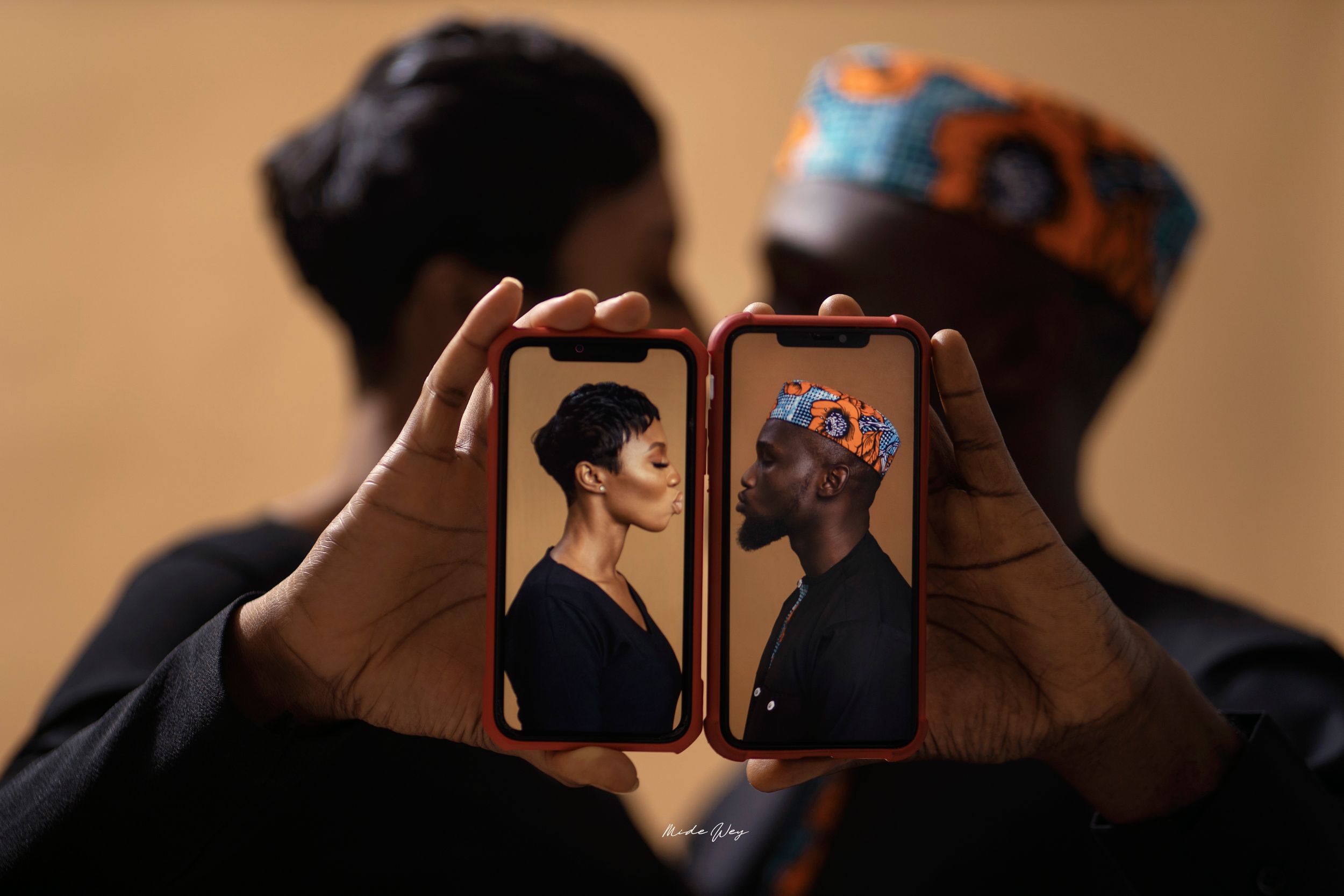 A collage of silhouettes showing people taking photos.