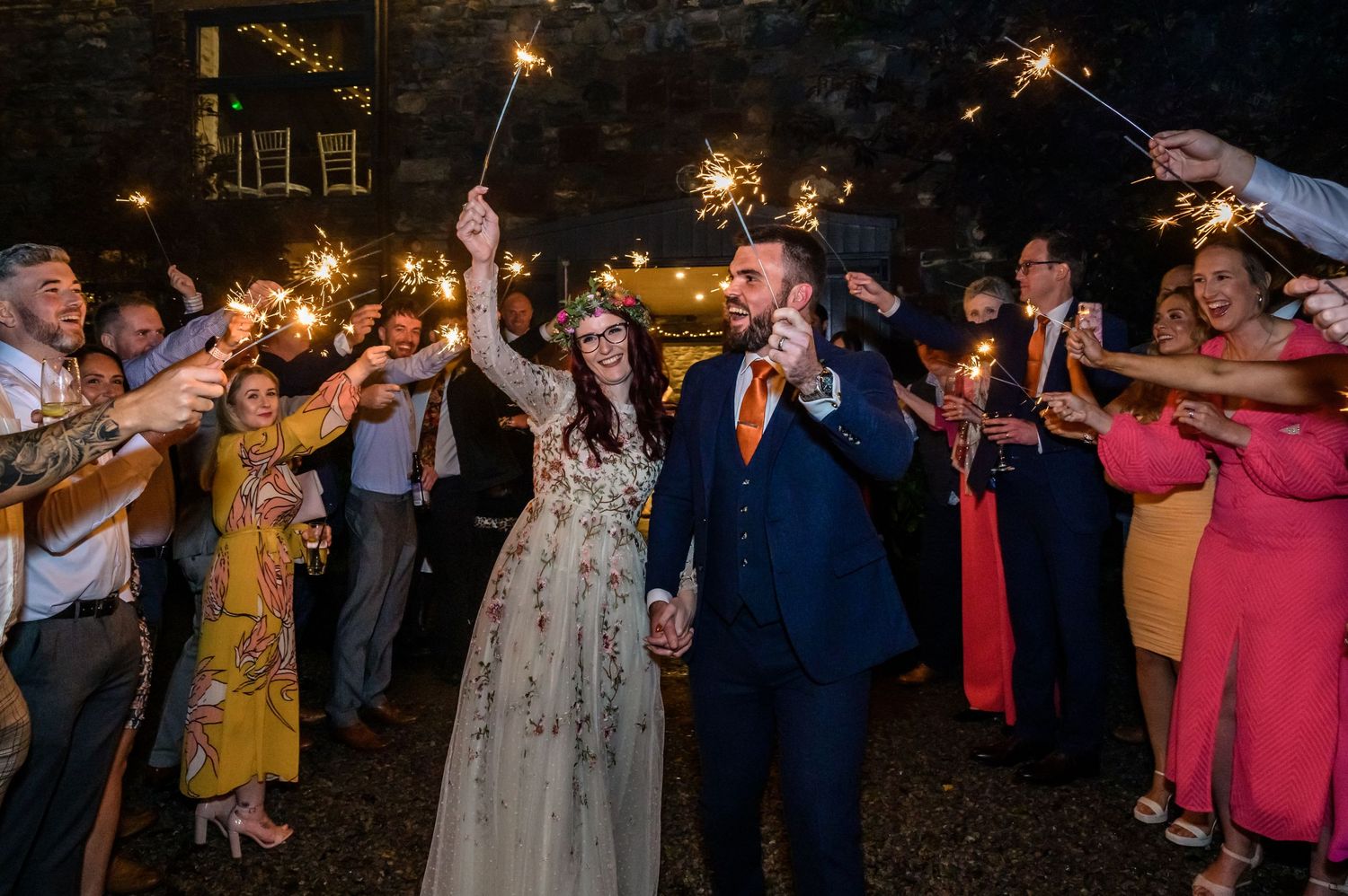 Bride and groom sparkler exit at Low Hall The Lakes
