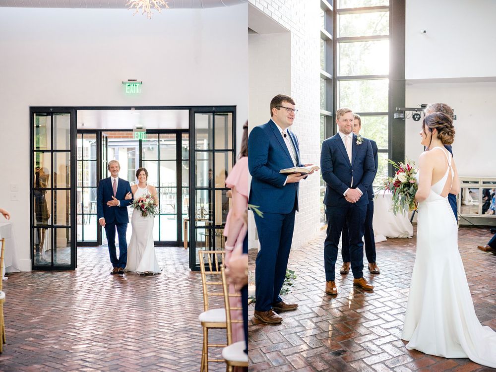 Indoor wedding ceremony processional with guests seated in gold chiavari chairs.