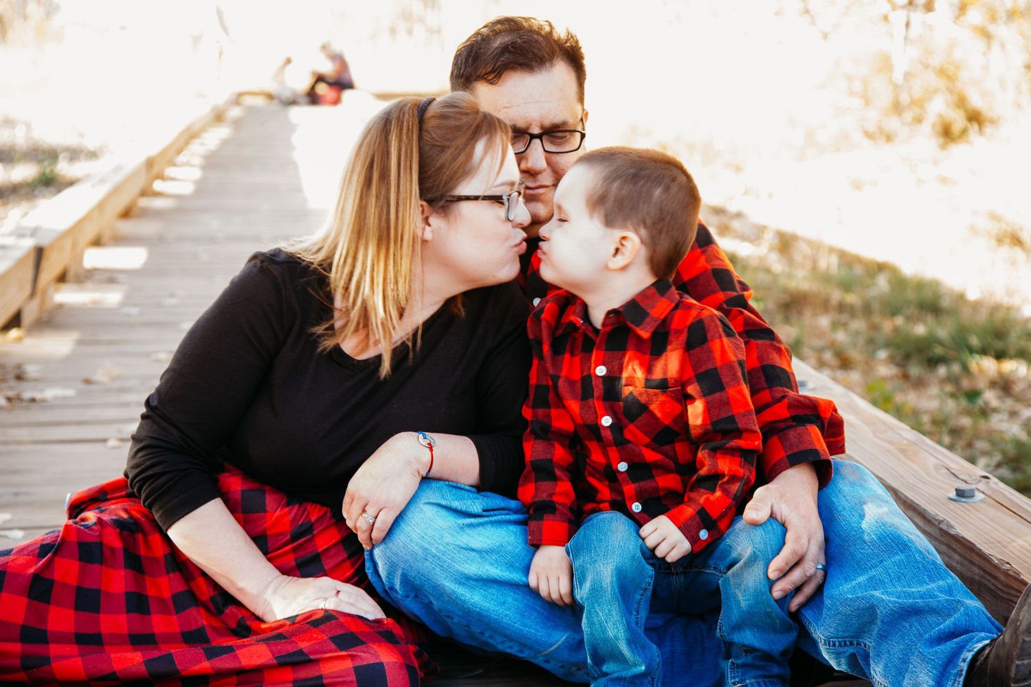 heart family posing for family photos while waiting for a heart transplant for their son