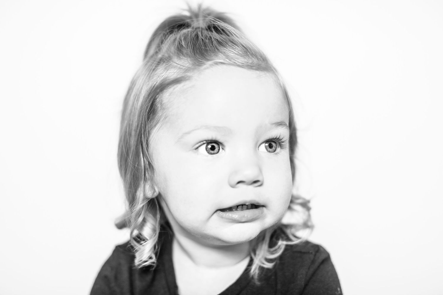 little girl has silly face in portrait by Stephanie Le Shana photography