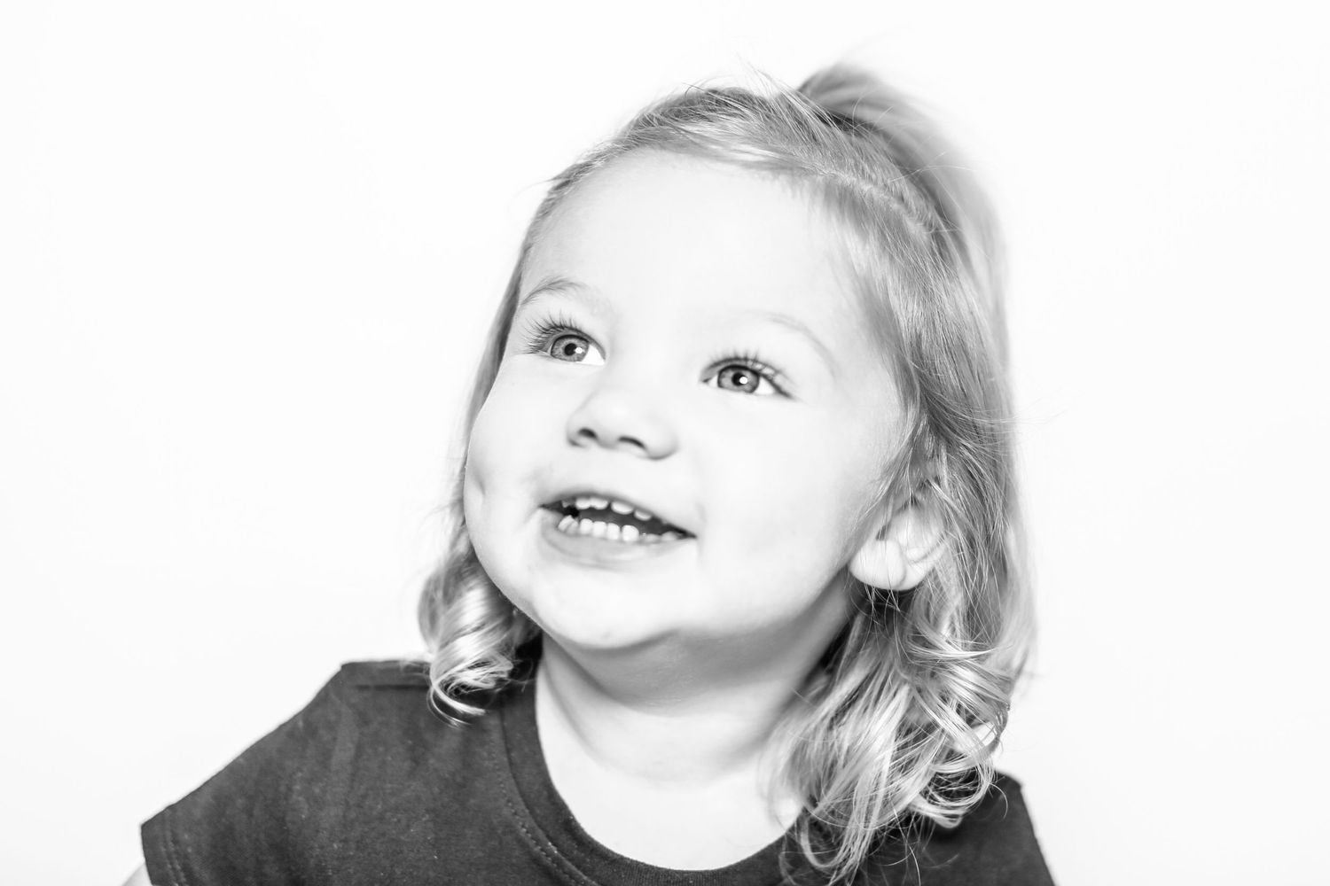 little girl smiles in portrait by Stephanie Le Shana photography
