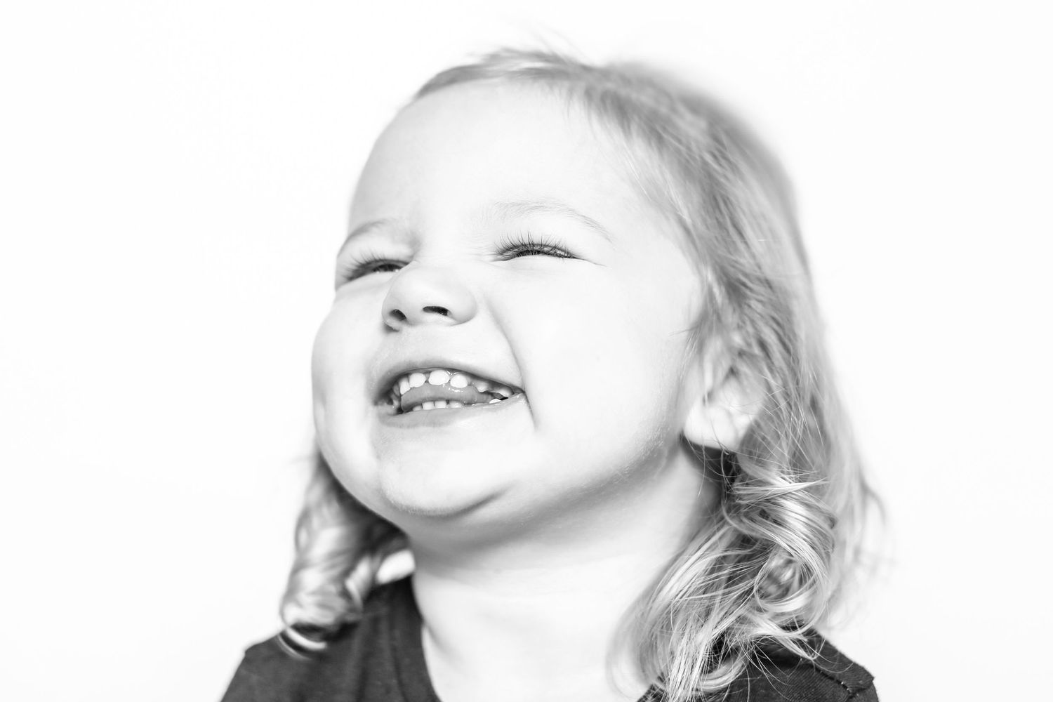 little girl smiles in portrait by Stephanie Le Shana photography