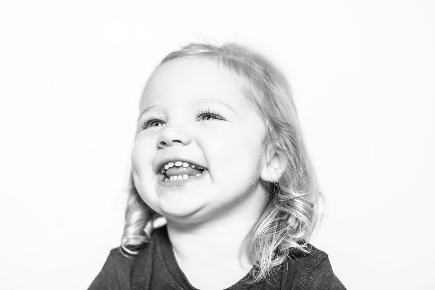 little girl smiles in portrait by Stephanie Le Shana photography