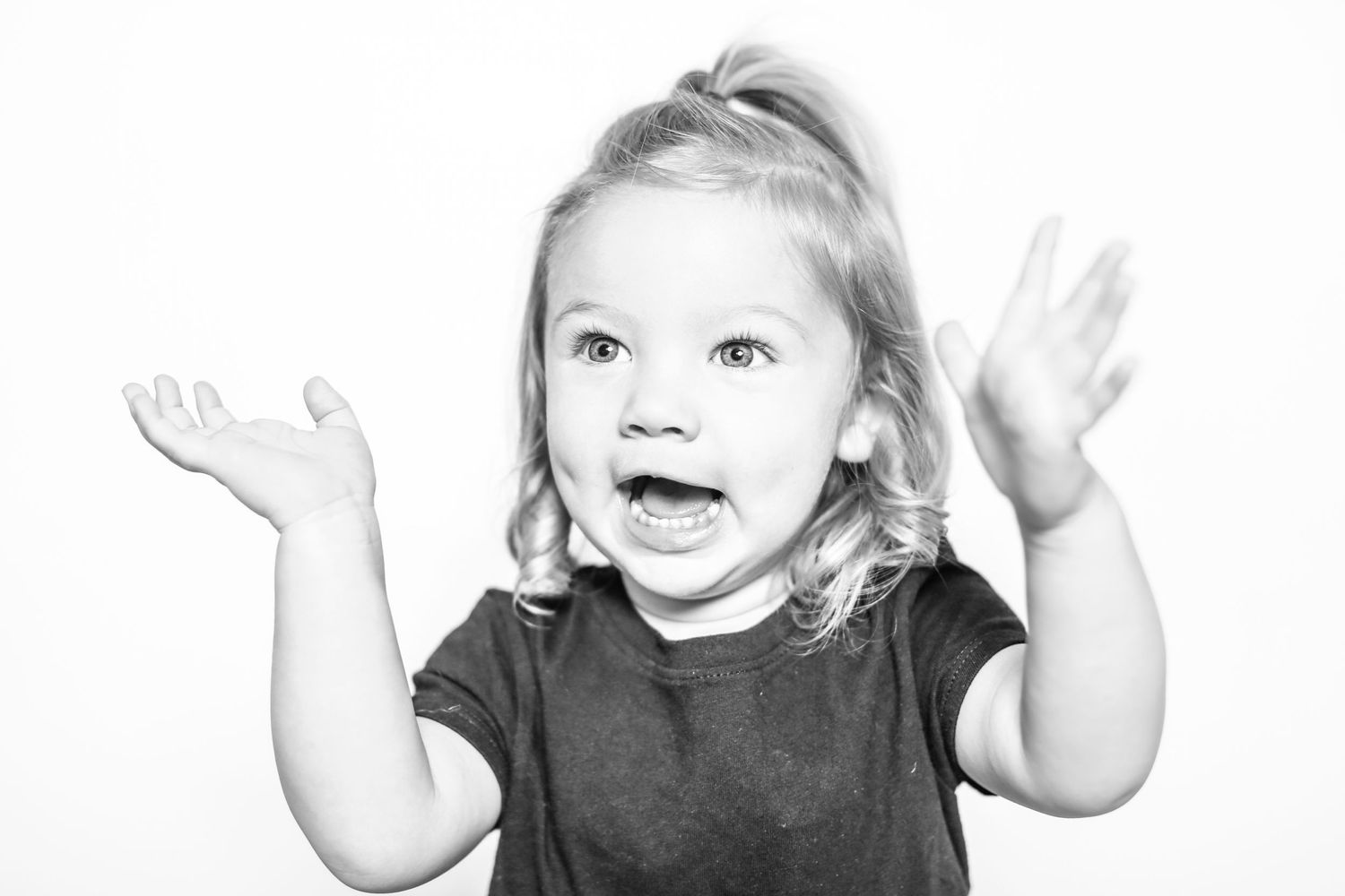 little girl claps in portrait by Stephanie Le Shana photography