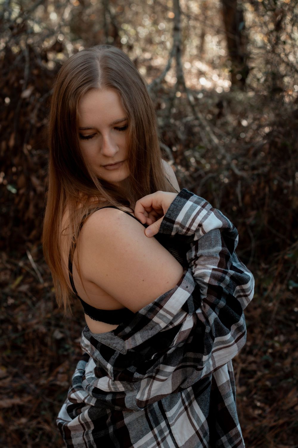 A series of artistic portraits showing a plaid flannel shirt against a dark forest background.