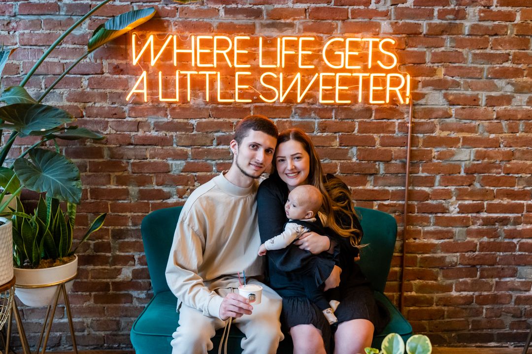 family of 3 on a couch