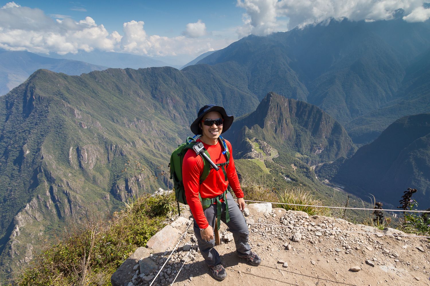 Picture of photographer Phu Bui after hiking up Machu Picchu in Peru.