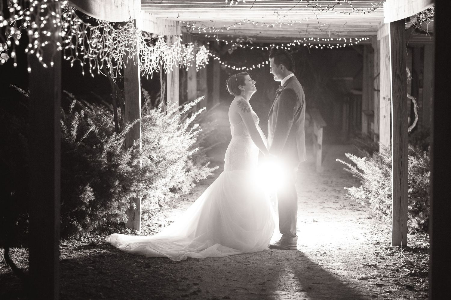 Bride and groom in Branson MO holding hands for Wedding