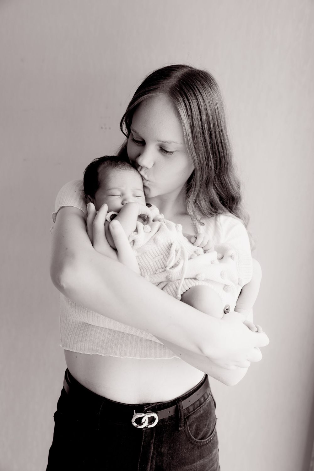 black and white photo of mum and baby