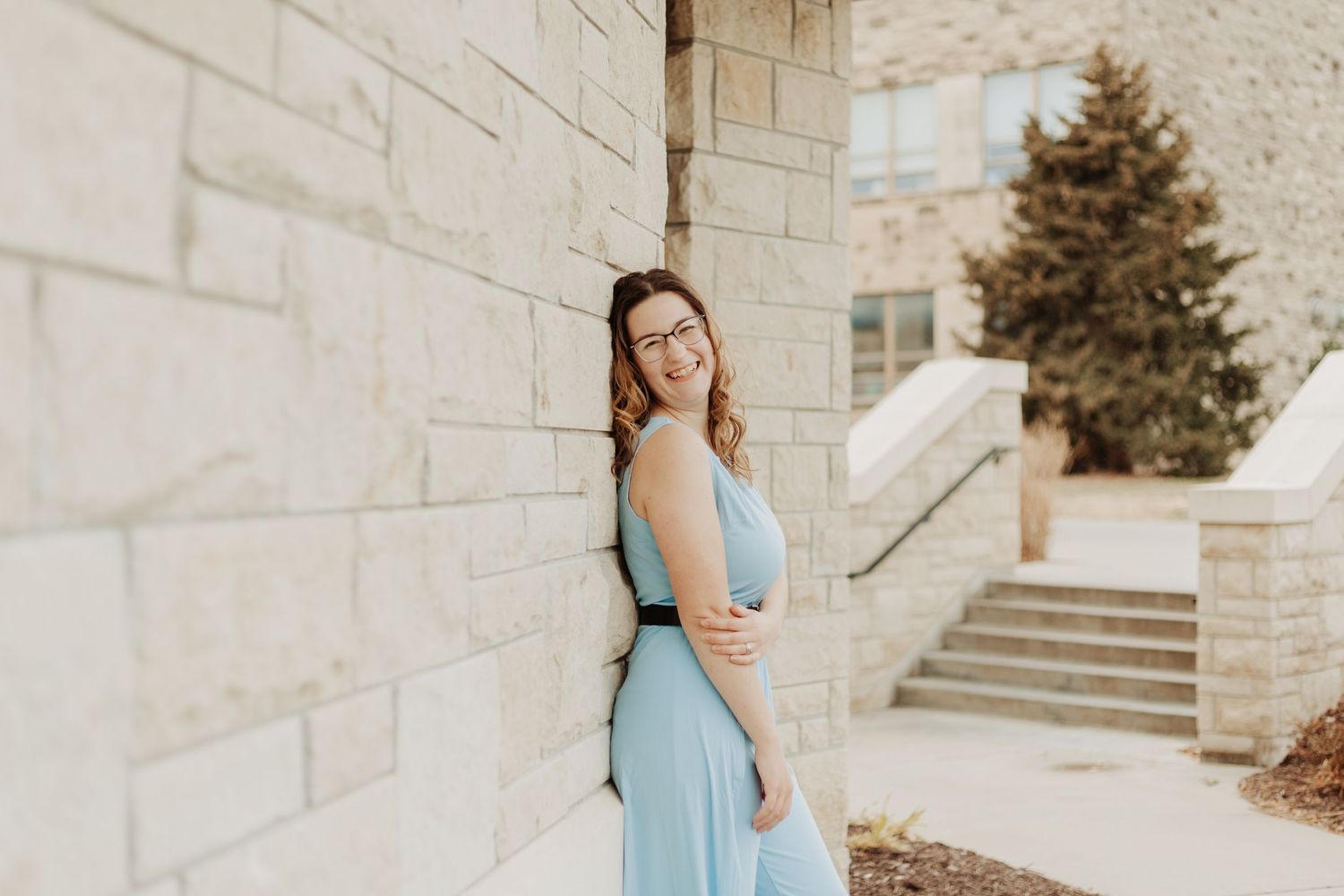 Senior photos in Manhattan, Kansas by portrait photographer – golden hour outdoor session with natural, candid senior portraits.