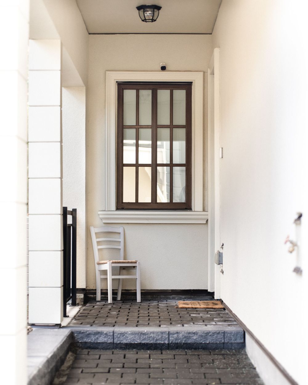 A window at the end of the walkway