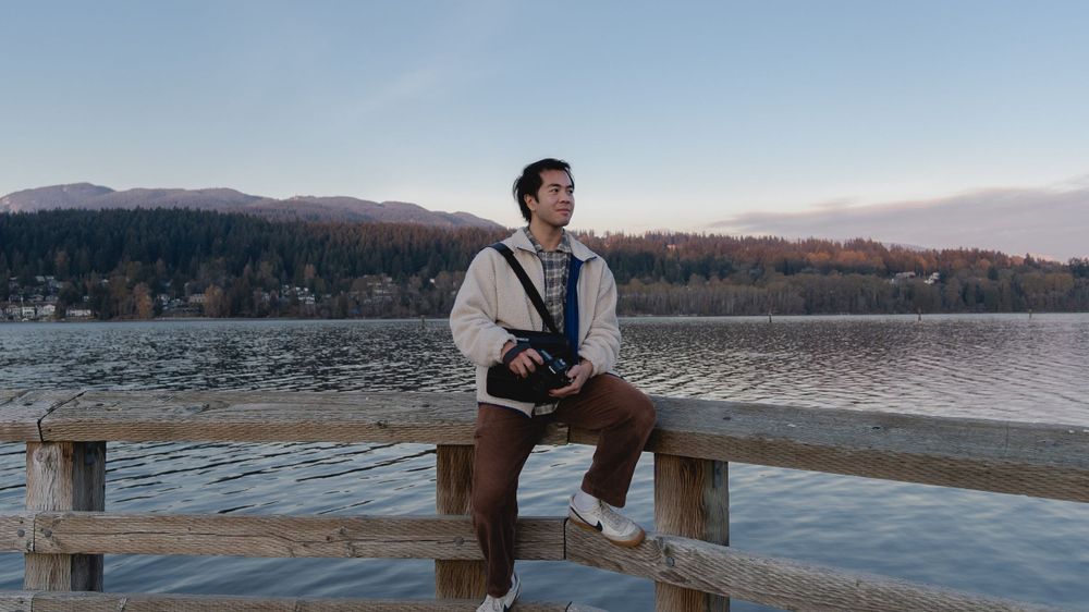 Person relaxing by the lake