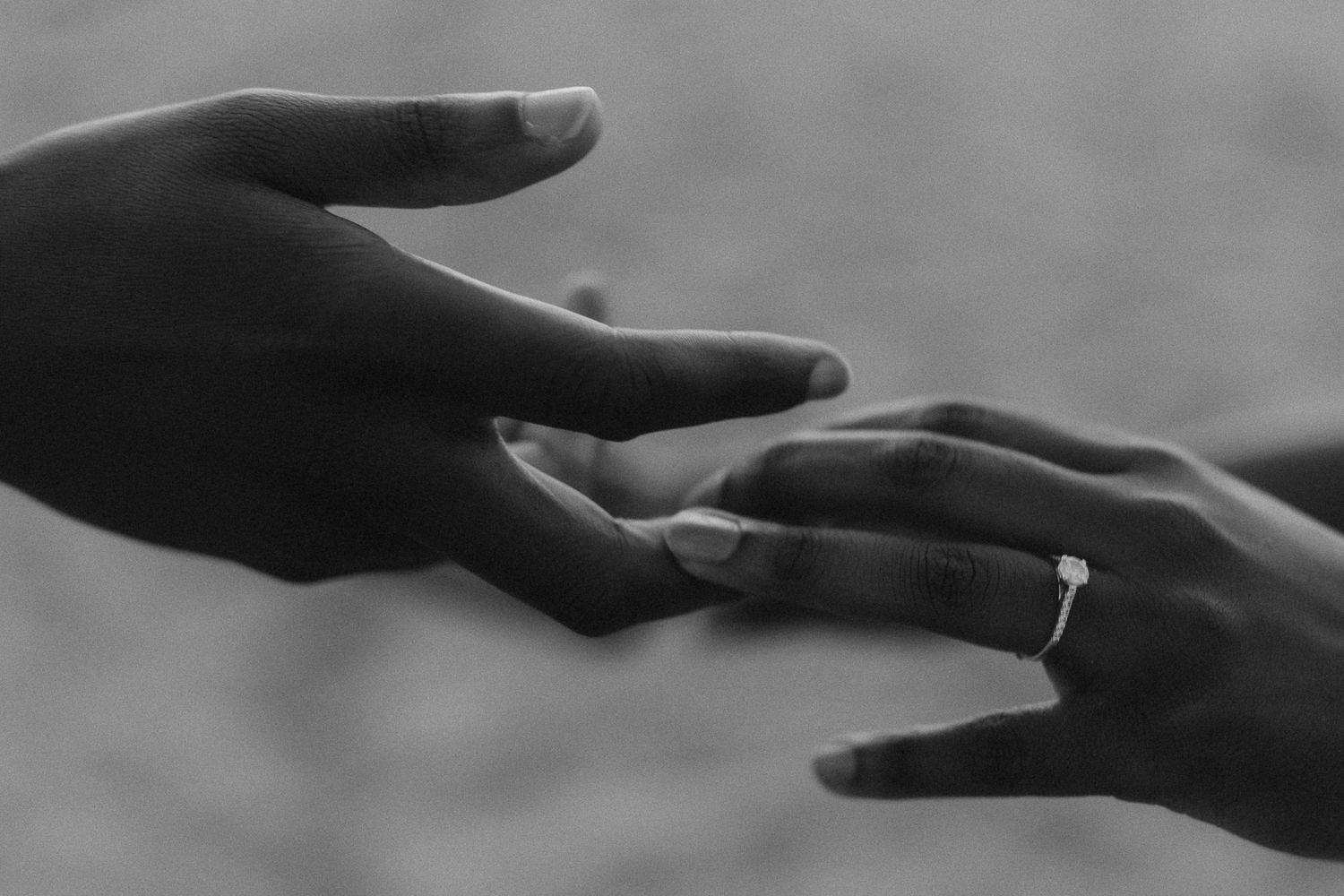 Couple hand in hand captured by engagement photographer based in London