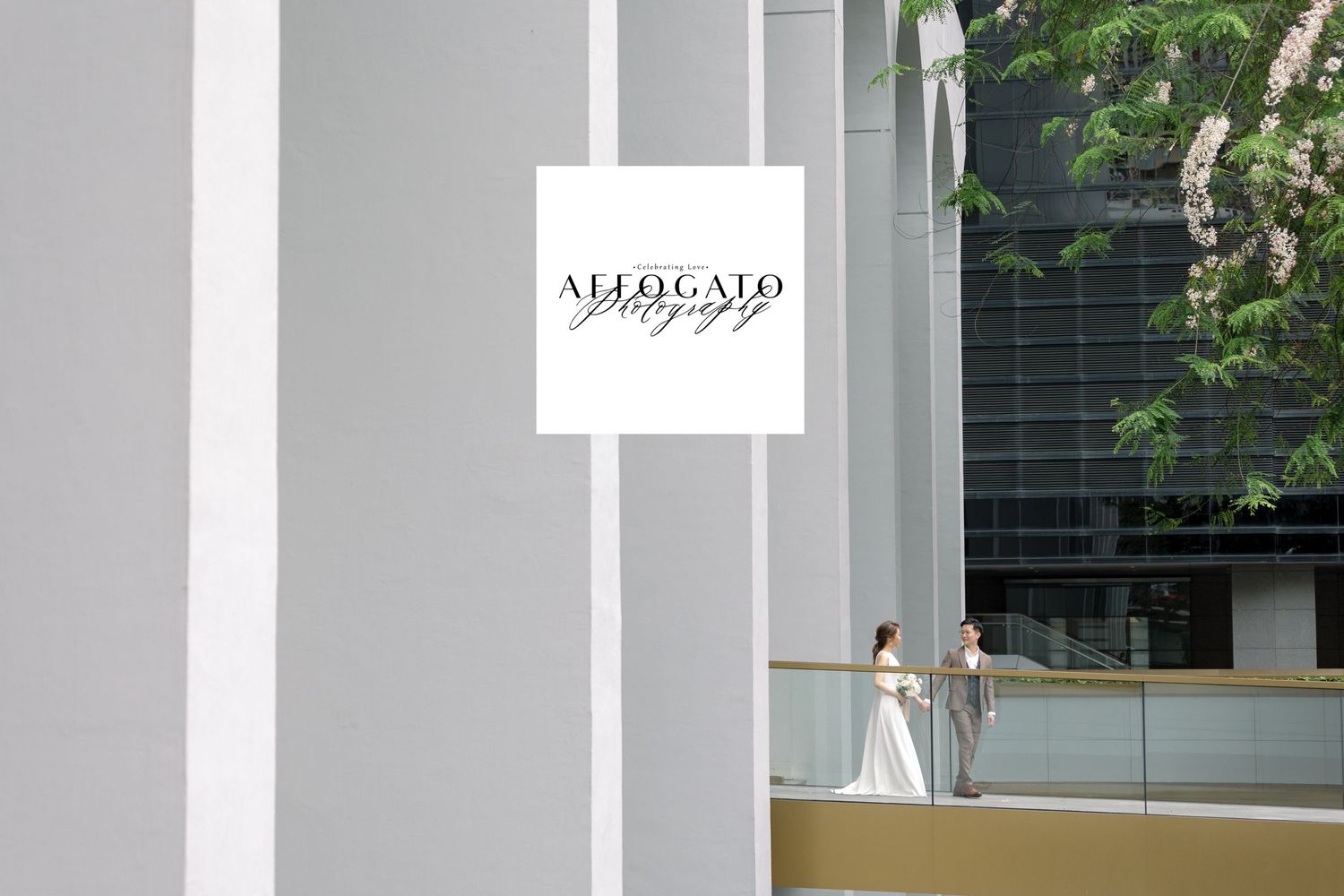 Minimalist architectural scene with elegant couple against white modern building.
