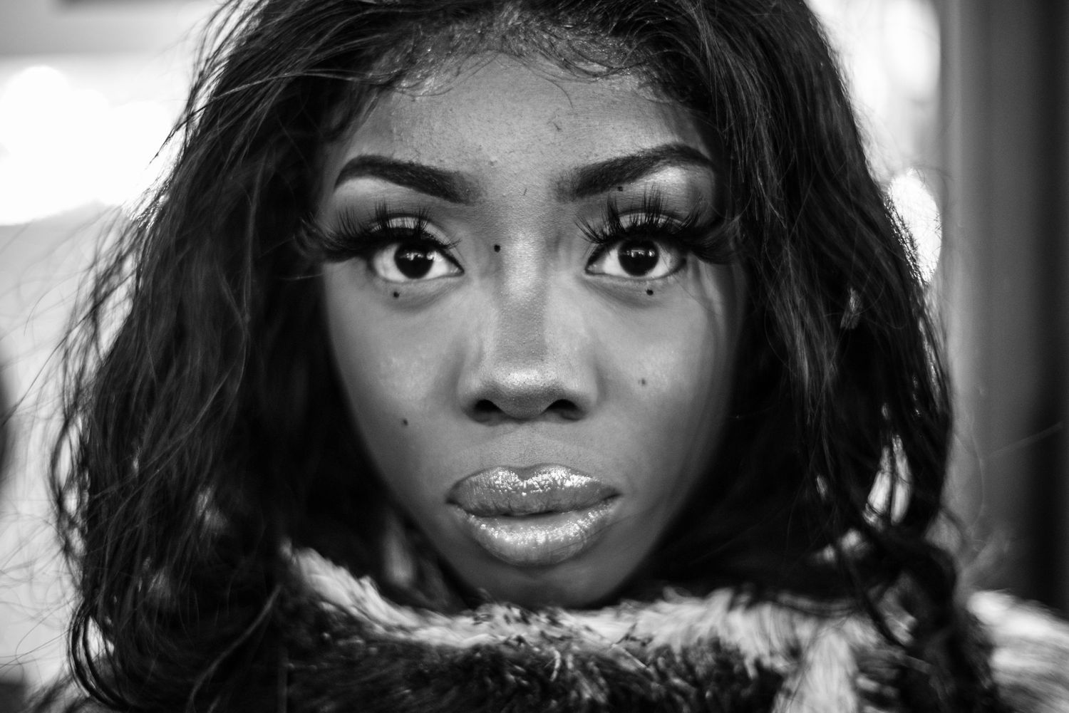 Black & White Portrait of a Stranger of a beautiful woman with large eyes and eyelashes