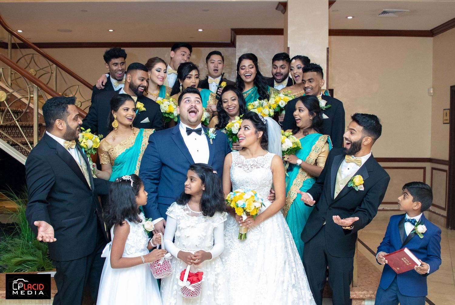Bridesmaids and Groomsmen laughing on wedding day