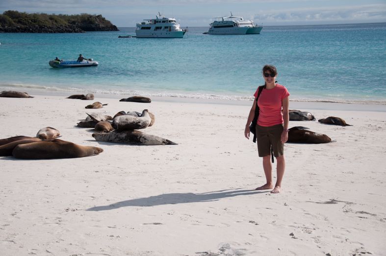 Leah Ramuglia on the beach in Española Island in the Galápagos Ecuador with sea lions