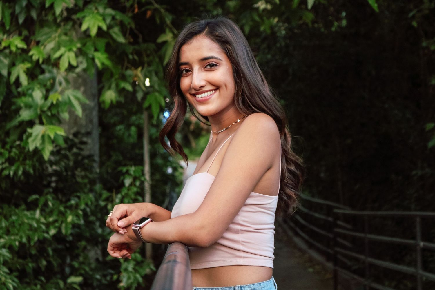 Professional natural-light portrait of college student in Fresno, California