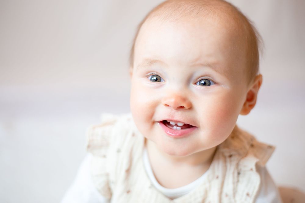 professional photography of baby girl smiling