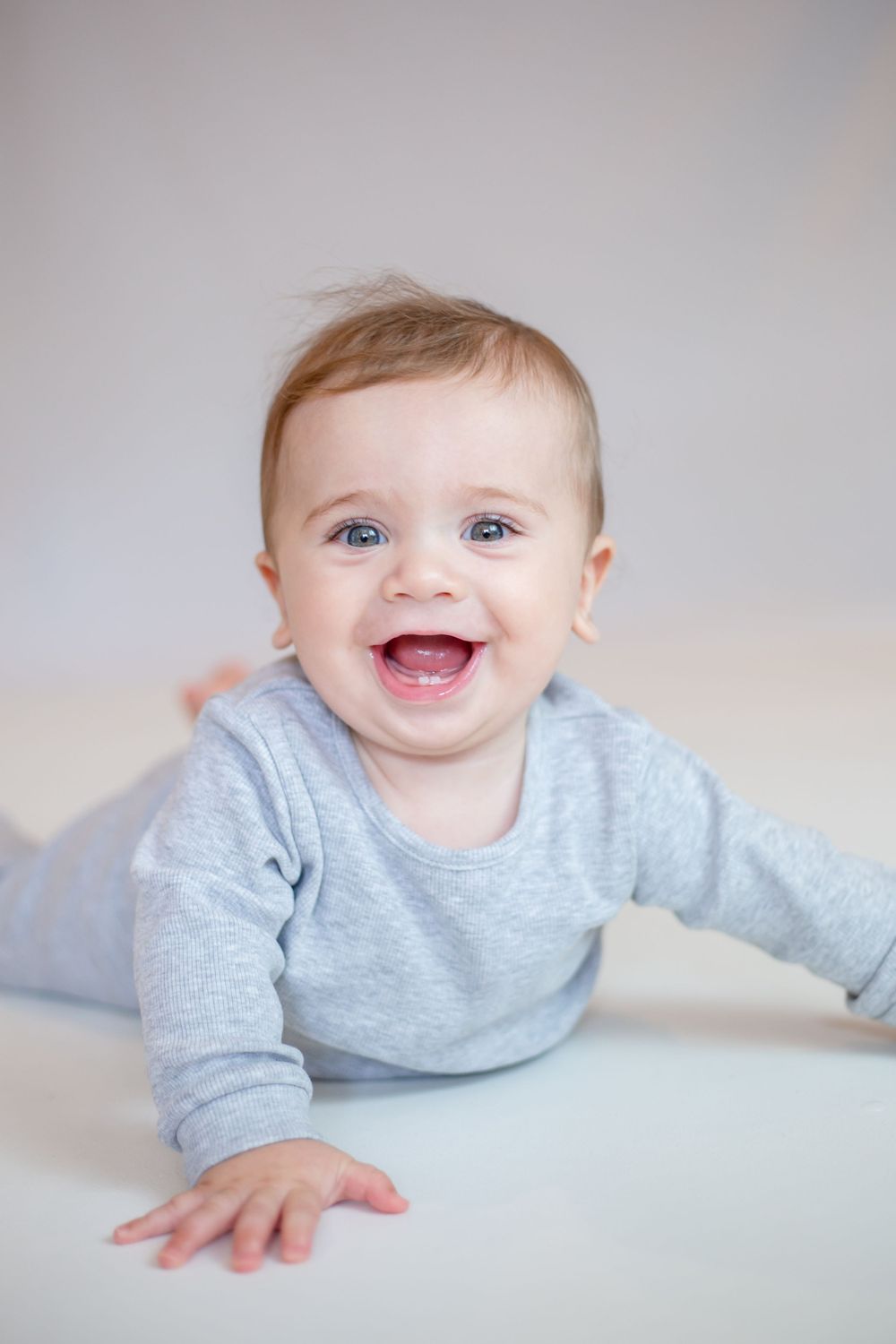 professional photo of baby boy smiling